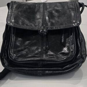 The Sak Ventura Stylish Black Leather Backpack Messenger Purse Handbag.